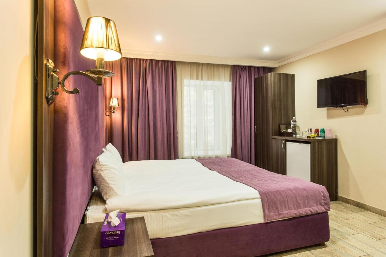 Hotel Baron Odessa Quarto foto